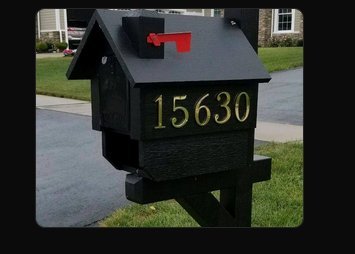 Black-painted cedar mailbox with brass-look numbers 15630